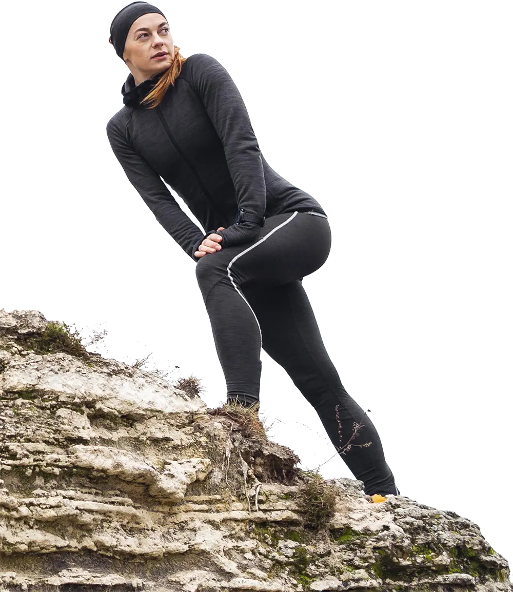 Corredora estirando antes de sesión de podología deportiva.